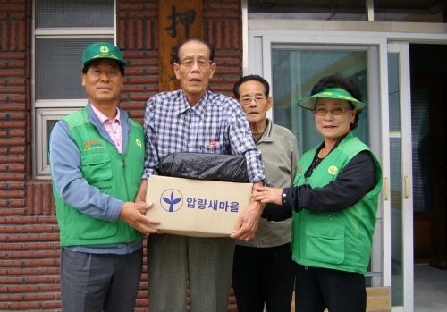 압량새마을회, 고구마·땅콩 ‘나눔’ 관내 공한지에서 재..